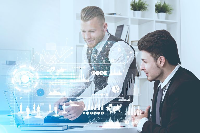 Close up of a young bearded businessman in a suit and his dark haired colleague sitting in a white office and working. Toned image double exposure